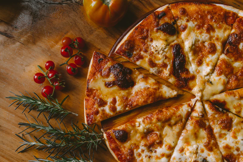 Freshly baked hot brick oven cheese pizza on Fuudr waitlist background